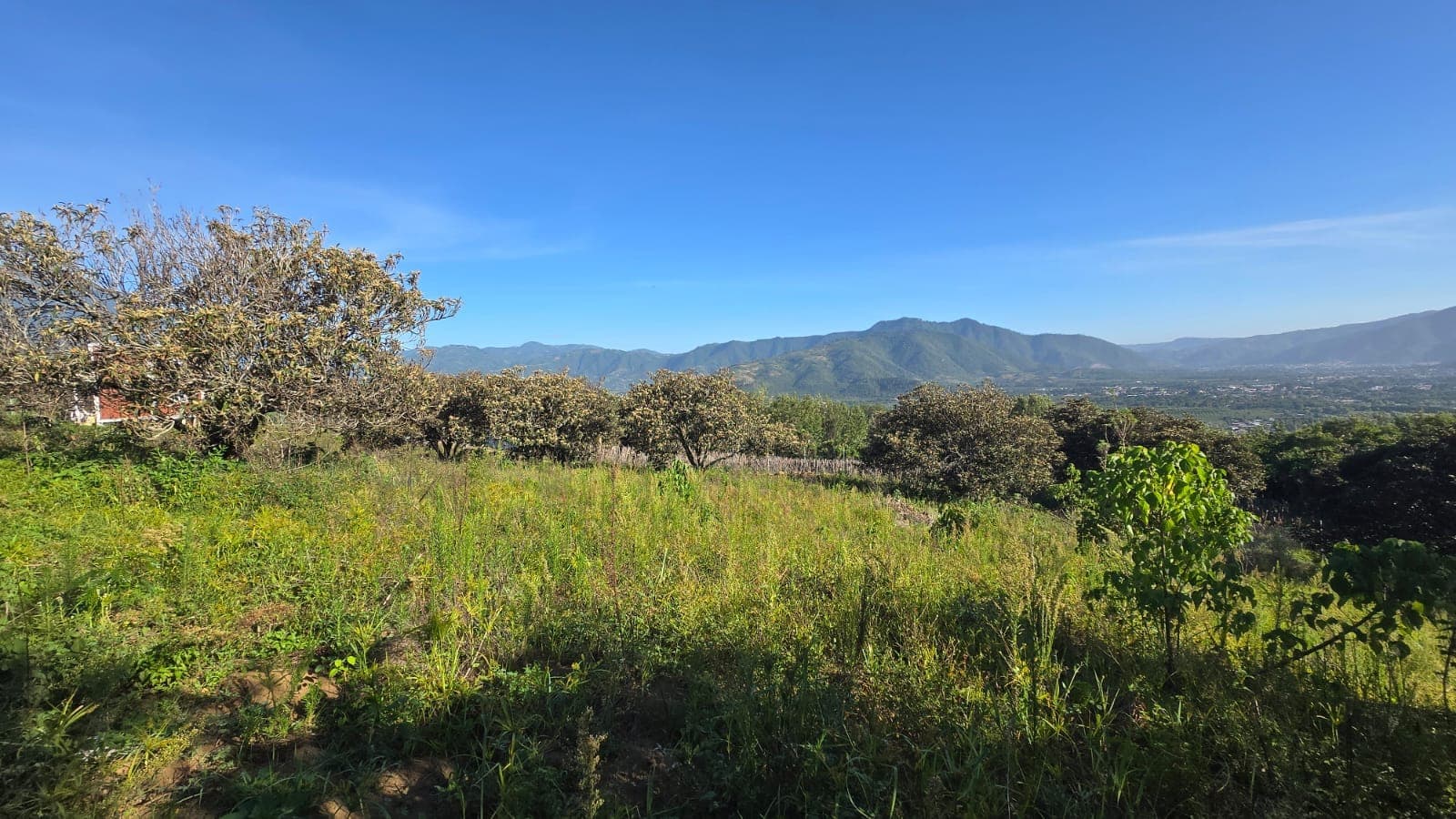 The land with the valley and mountains behind